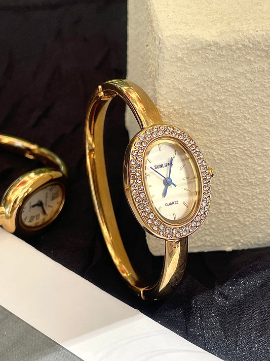 Vintage-Inspired Diamond Gold Oval Watch for Women Roman Numeral Dial Bangle Watch
